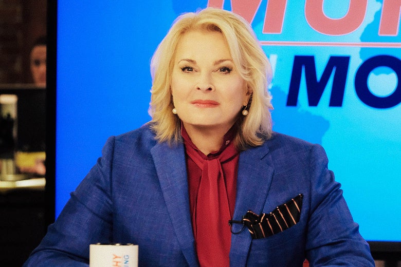 Candice Bergen, as Murphy Brown, stares into the camera.